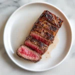 finished sous vide New York strip steak with bite